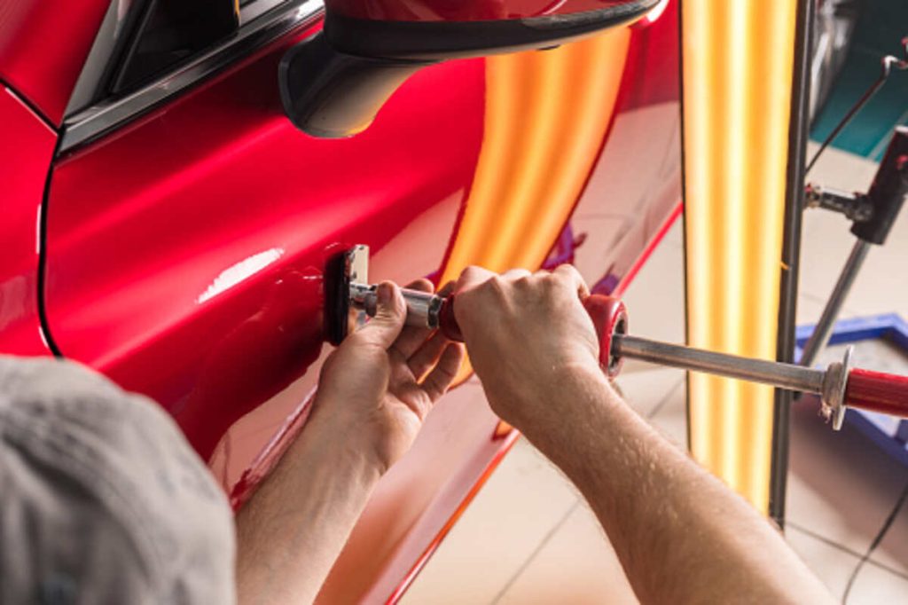 removing dents from cars